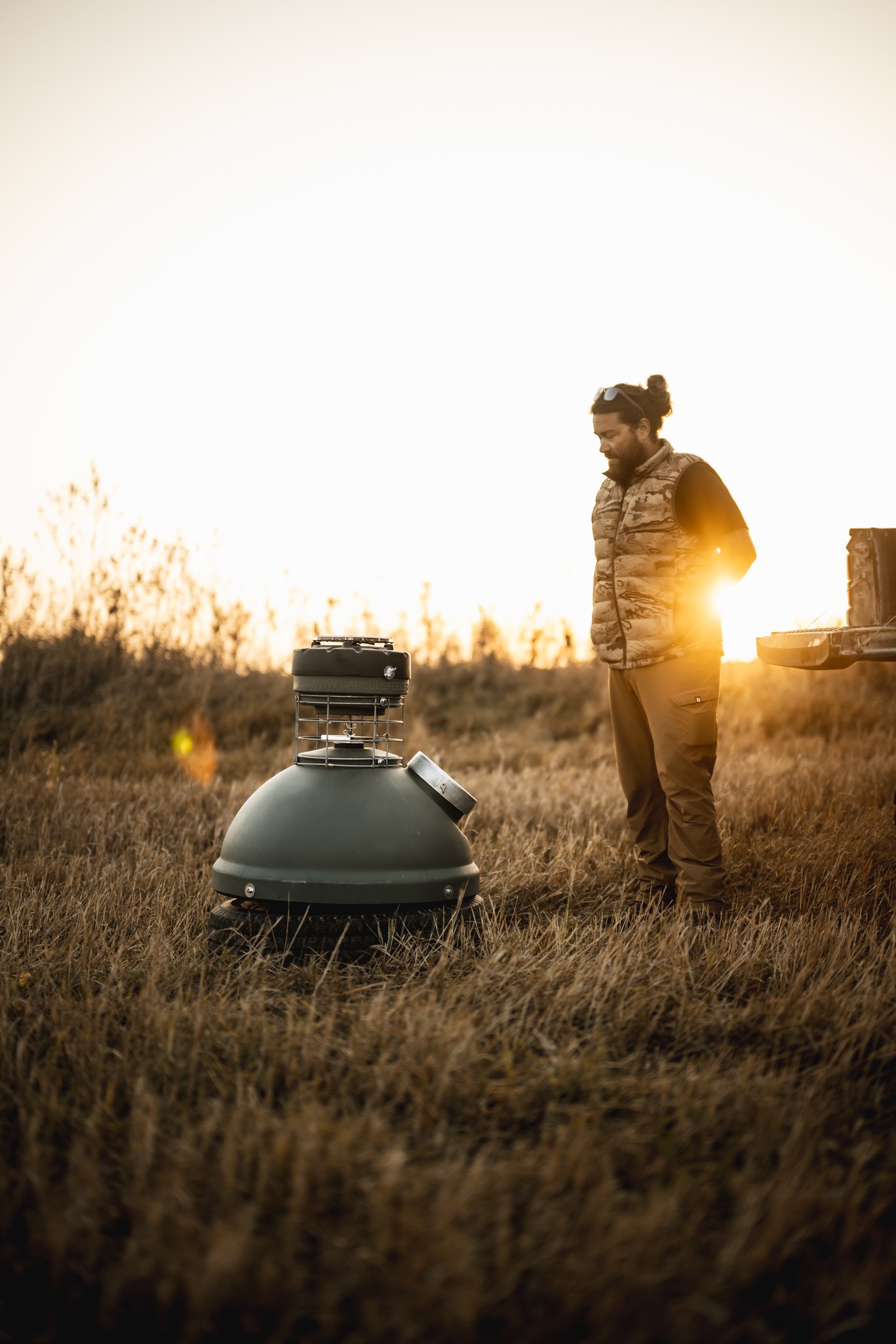 Capsule feeder at golden hour